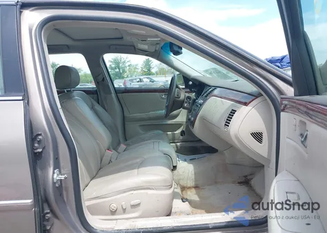 2006 Cadillac Dts из США, поврежденный, VIN 1G6KD57Y06U197794